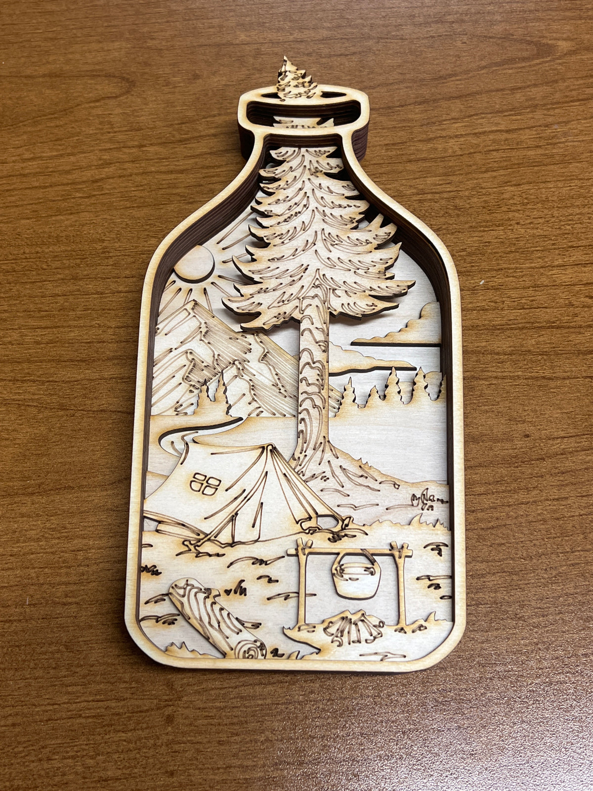 Bottle with Camping Scene